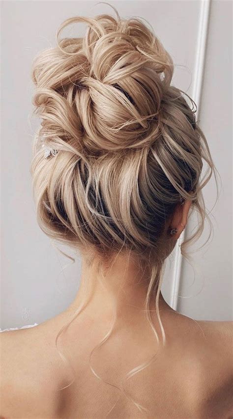 Updo Hairstyles For Your Stylish Looks In 2021 : Messy high bun | Bun hairstyles, Hair updos ...