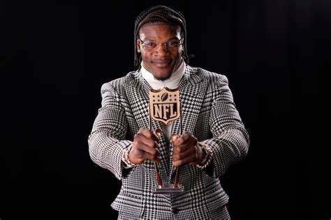 Lamar Jackson collects second NFL MVP award | The Independent