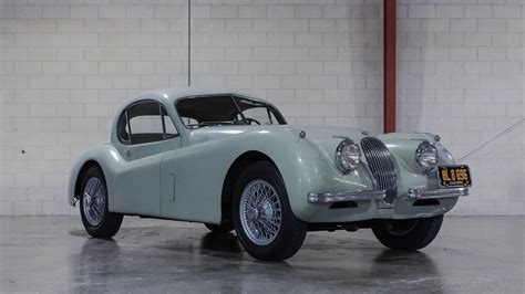 1953 Jaguar XK120 SE Fixed Head Coupe | The Amelia Auction 2023 | Classic Car Auctions | Broad ...