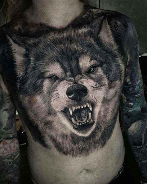 amazing wolf tattoo on chest | Wolf tattoos men, Tattoo designs men ...