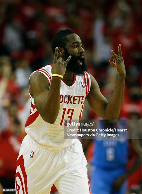 The Houston Rockets shooting guard James Harden reacts after scoring ...