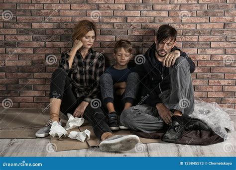 Poor Homeless Family Sitting on Floor Stock Image - Image of failure ...