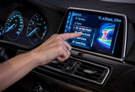 CES 2015: BMW demonstrates future iDrive with touchscreen, gesture and tablet control bmw-iDrive ...