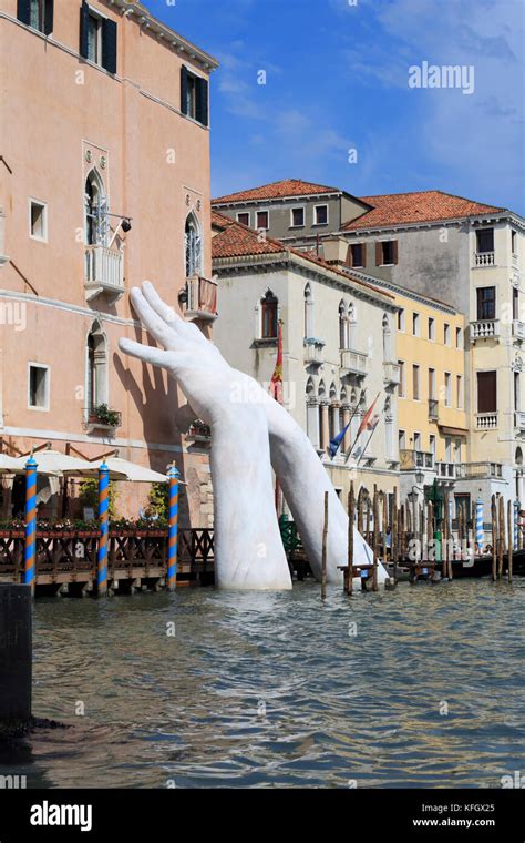 Lorenzo Quinn Hands sculpture on the Grand Canal, Venice Stock Photo ...