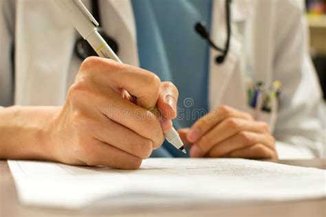 Doctor Writing Prescription Stock Photo - Image of caucasian, group: 87601598