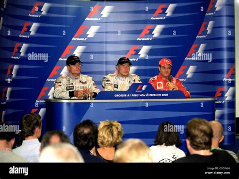 Mika hakkinen and rubens barrichello face the worlds press hi-res stock photography and images ...