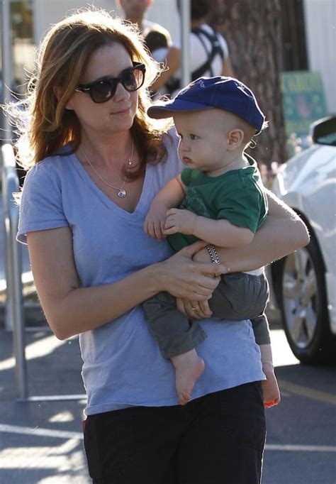 Jenna Fischer and husband Lee Kirk take their son Weston grocery ...