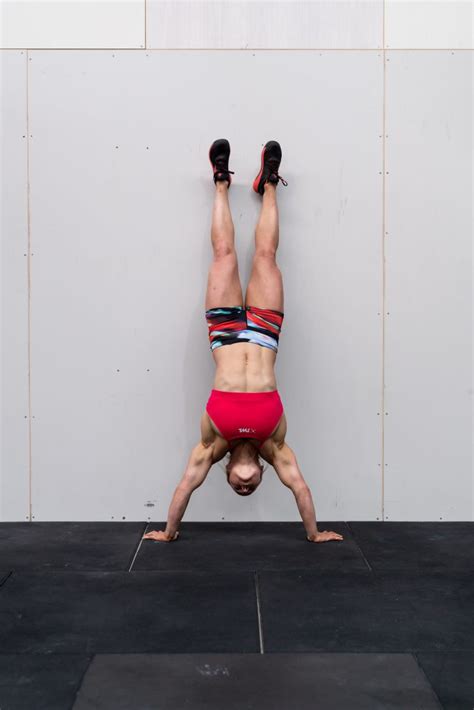 How to Do Handstand Push-Ups in 20.3 - The WOD Life