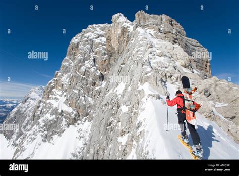 hiking in the snowy mountains Stock Photo - Alamy