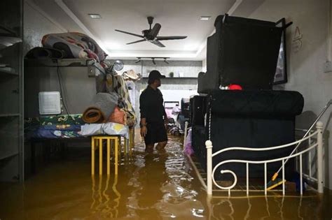 At least four dead, thousands evacuated in Malaysia floods