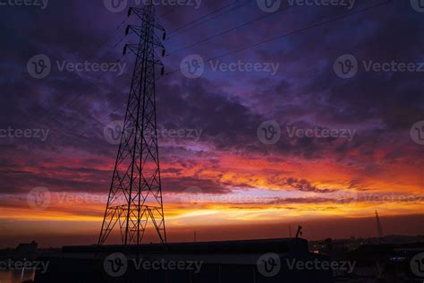 High voltage power line tower with beautiful sky at sunset, stock photo ...