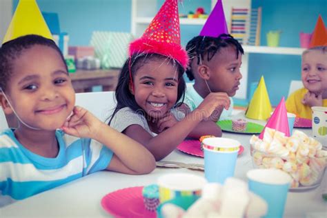 Excited Kids Enjoying a Birthday Party Stock Photo - Image of amusement, girl: 61438410