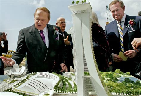 Sheldon Adelson, chairman and CEO of Las Vegas Sands Corp., left, and ...