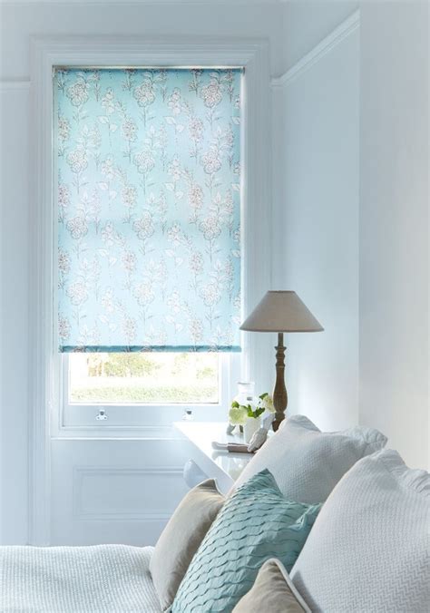 Our Fabulous Flowers Blue Roller blind will add a softness to a bedroom. The beautiful duck egg ...