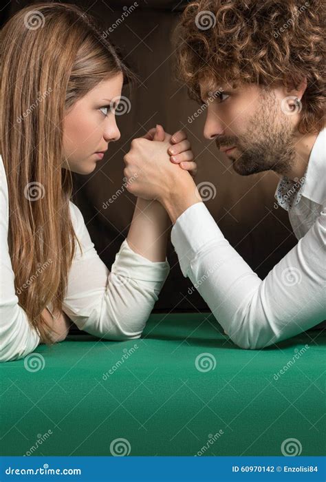 Arm Wrestling between Man and Woman Stock Photo - Image of concept ...