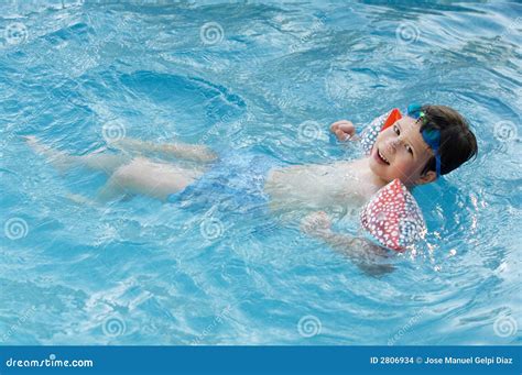 Boy learning to swim stock photo. Image of water, youthful - 2806934