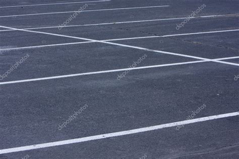 Empty parking lot with white lines — Stock Photo © PixelsAway #2434736