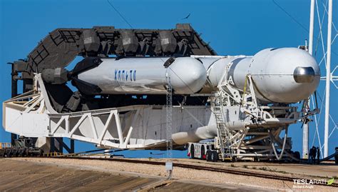 SpaceX Falcon Heavy rocket rolls to pad for Tuesday launch, dual booster landing