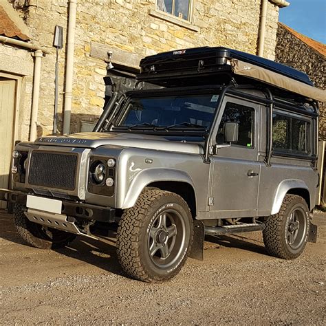 Land Rover Defender 90 TentBox Fitting to a Roof Rack on a Roll Cage ...