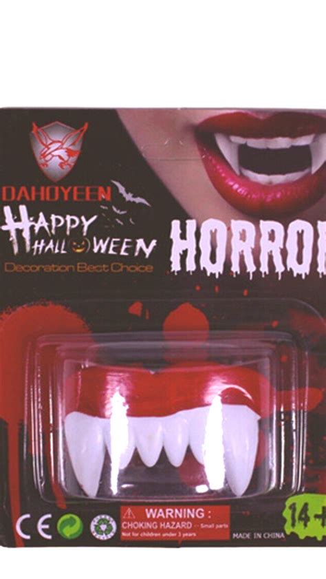 Halloween Teeth. Horror Fake Vampire Teeth.