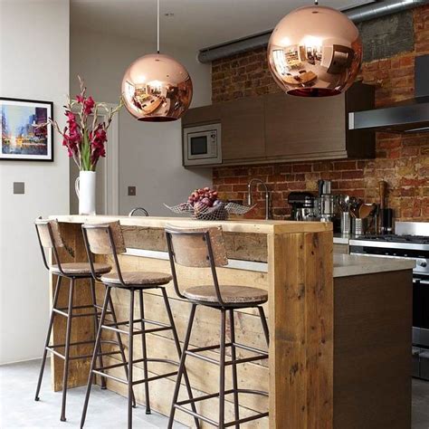 Kitchen island with breakfast bar: types and design ideas for your home