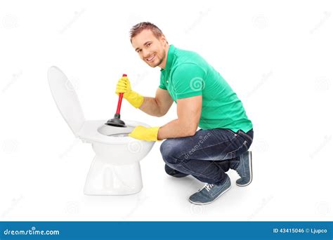 Happy Man Unclogging a Toilet with Plunger Stock Photo - Image of ...