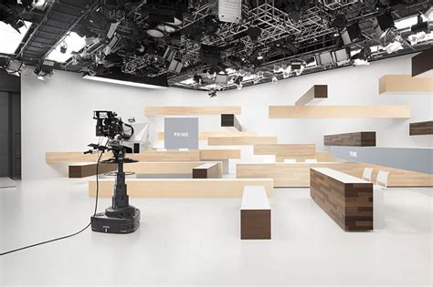 nendo designs prime news branding and studio set for a japanese TV ...