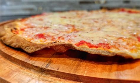 Chicago Thin-Crust Pizza Recipe (Tavern Style Cracker Crust)