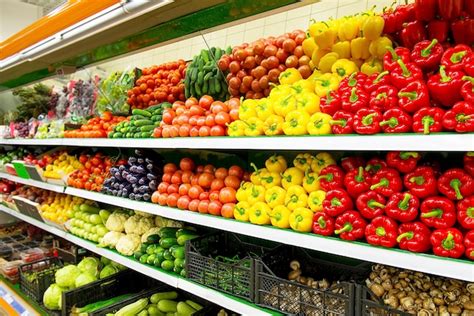 Premium Photo | Fresh organic Vegetables and fruits on shelf in ...