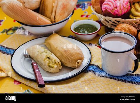 Mexican Tamales green sauce traditional food in Mexico Stock Photo - Alamy