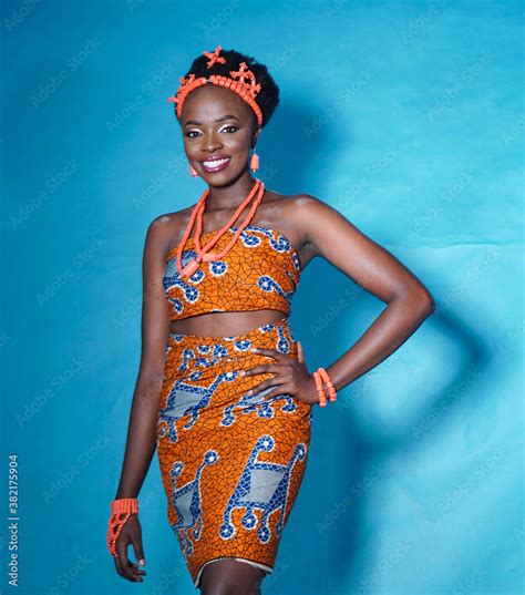 Portrait of beautiful Nigerian Woman wearing traditional Igbo dress Stock Photo | Adobe Stock