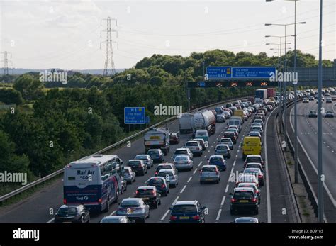 Slow moving traffic out of London on the M4 motorway Stock Photo - Alamy