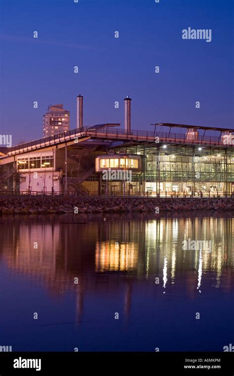 The National Glass Centre in Sunderland is reflected in the River Wear at night. Sunderland Tyne ...