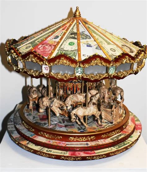 Money Makes the Merry-Go-Round Mixed media, Musical carousel with lights and movement Music Box ...