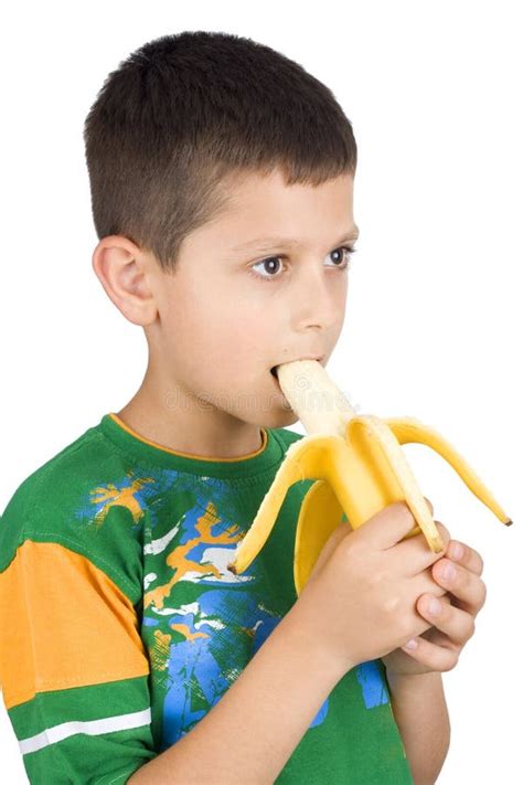 Boy eating banana stock image. Image of snack, bite, people - 5399477