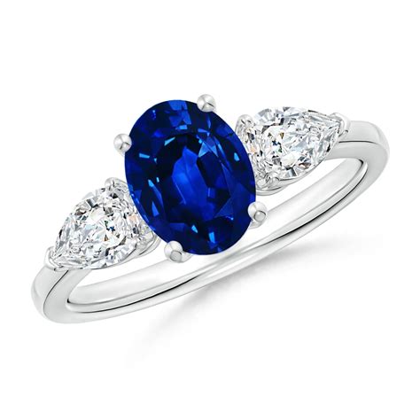 Angara - September Birthstone Ring - Oval Blue Sapphire Three Stone Ring with Pear Diamonds in ...