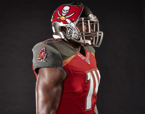 New Tampa Bay Buccaneers uniform features throwback orange, reflective chrome - Sports Illustrated