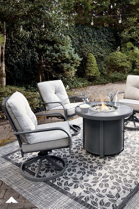 Donnalee Bay Dark Gray Round Fire Pit Table and 2 Swivel Lounge Chairs | Outdoor by Ashley | # ...