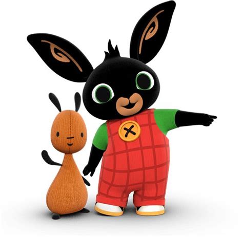 a black rabbit standing next to a small orange and brown bunny on a white background