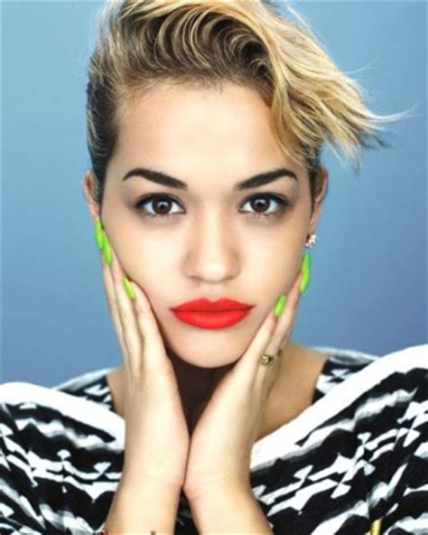 Rita Ora Tattoos & Meanings - A Complete Tat Guide