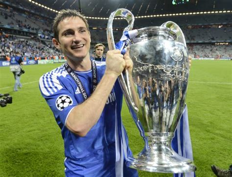 Lampard of Chelsea celebrates with the UEFA Champions League trophy ...