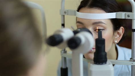 Eye examination at slit lamp in oculist office Stock Video Footage 00:17 SBV-314044030 - Storyblocks