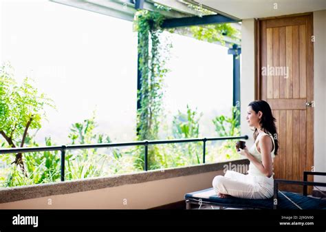 Woman Drinking Tea at Six Senses Spa, Heritance Kandalama Hotel ...