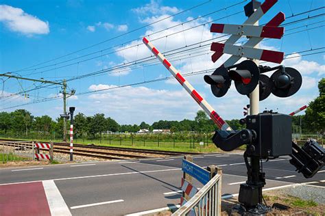 Railroad Crossing Gate Stock Photos, Pictures & Royalty-Free Images - iStock