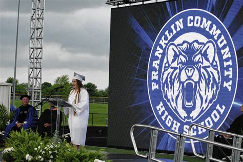 One last test: Franklin graduates toss caps under rain clouds - Daily Journal