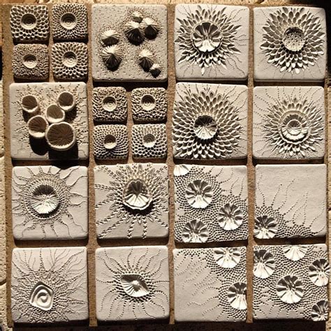 Smaller tiles drying in the afternoon sun. Kiln is being fired up tonight with the larger ones ...