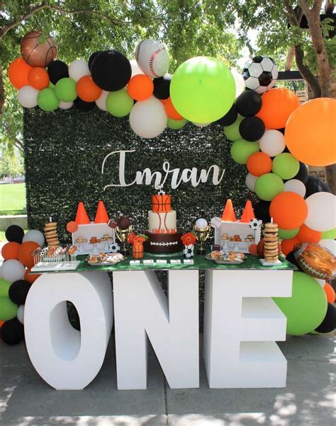 WOW!! The dessert table at this Sports themed 1st birthday party! Love ...