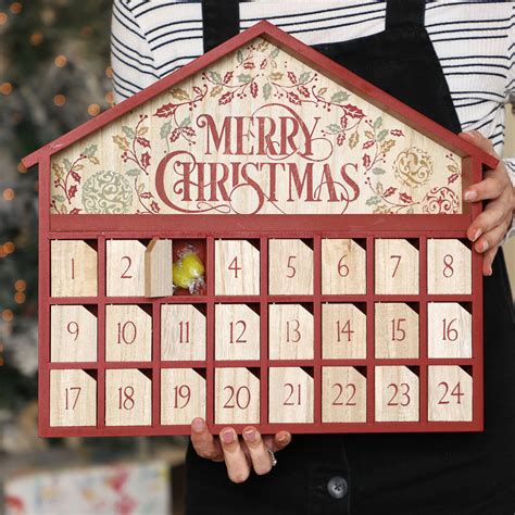 merry christmas wooden advent calendar house by dibor | notonthehighstreet.com