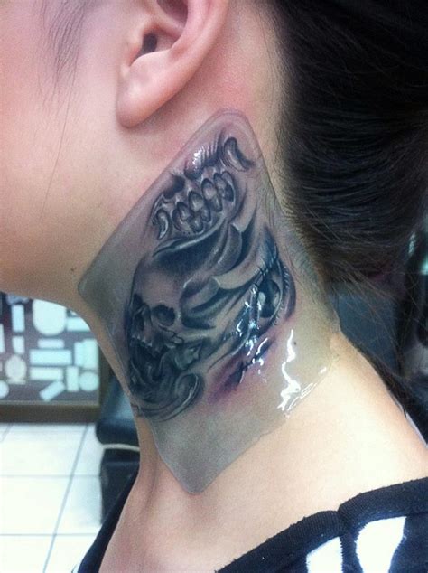 Skull Neck Tattoo