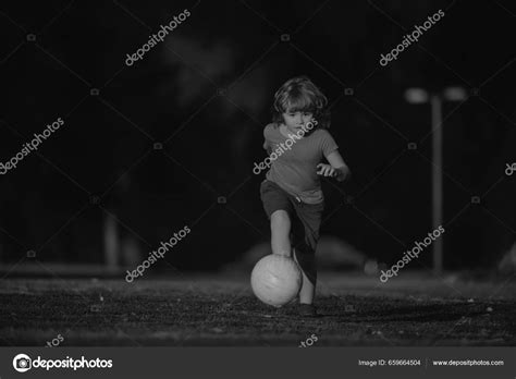 Little Black Kids Playing Football